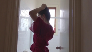 Fingering in the bath along with shaved girl