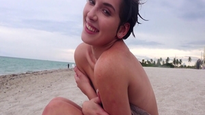 Young brunette crazy cumshot at the beach